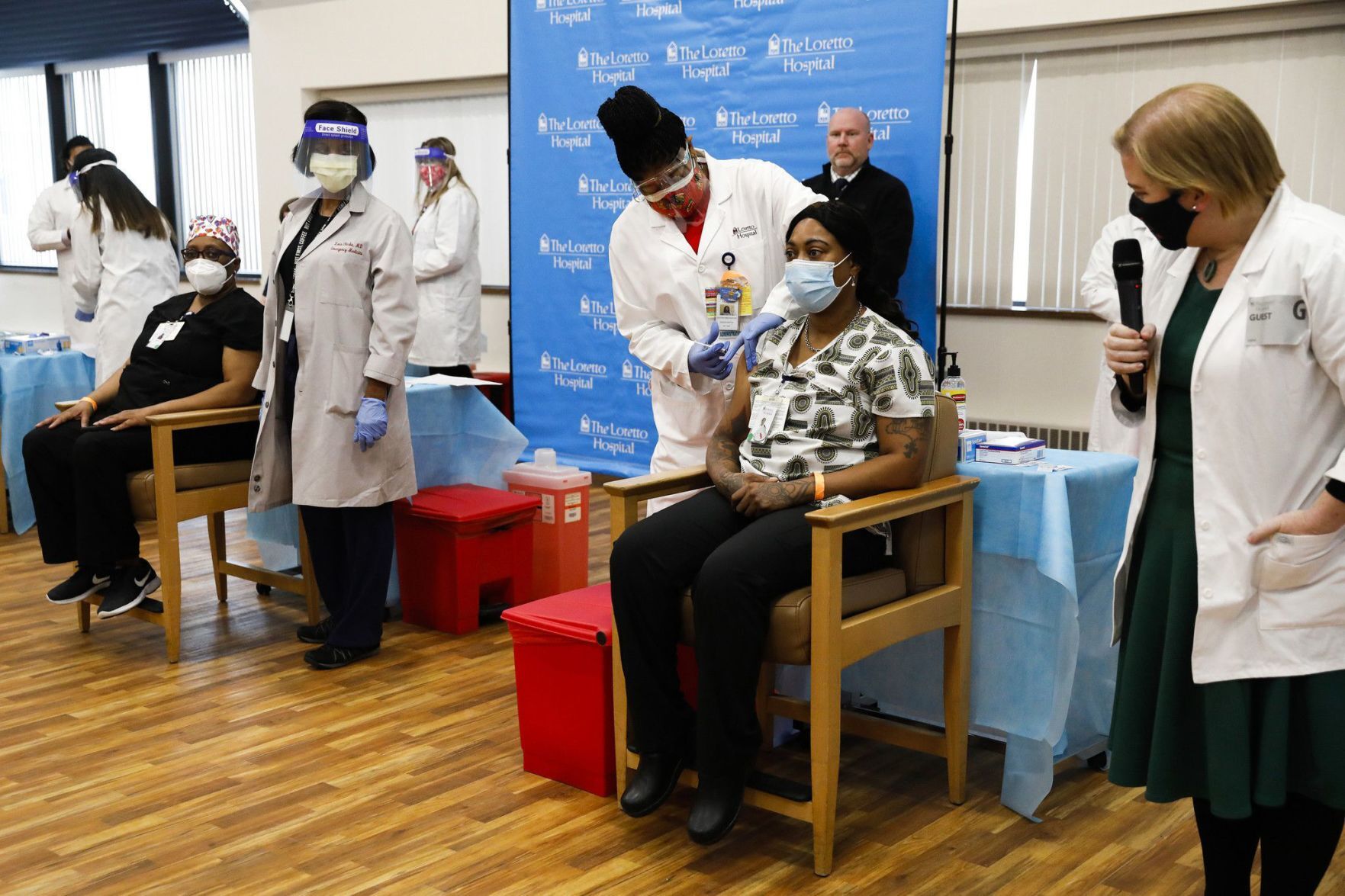 US-NEWS-ILLINOIS-STARTS-ADMINISTERING-COVID-19-VACCINE-10-TB.jpg